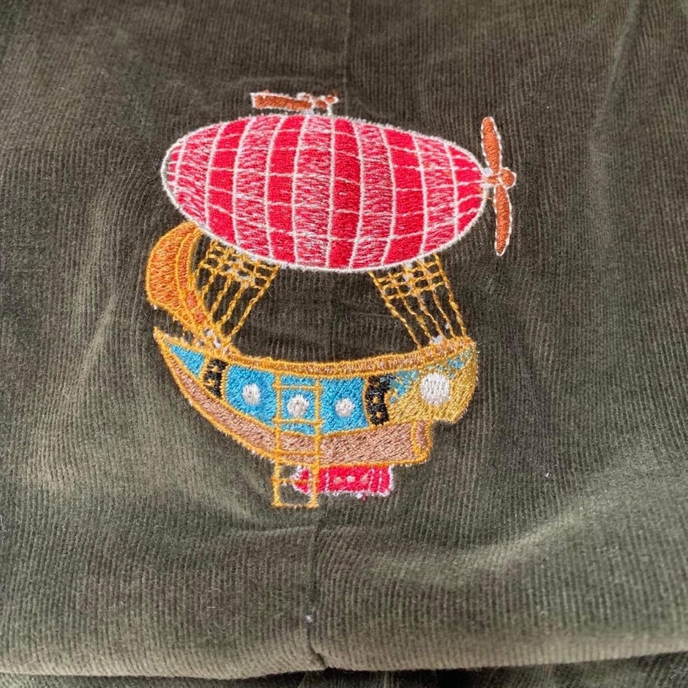 Upcycled Calvin Klein Blazer with Air Ship on back.